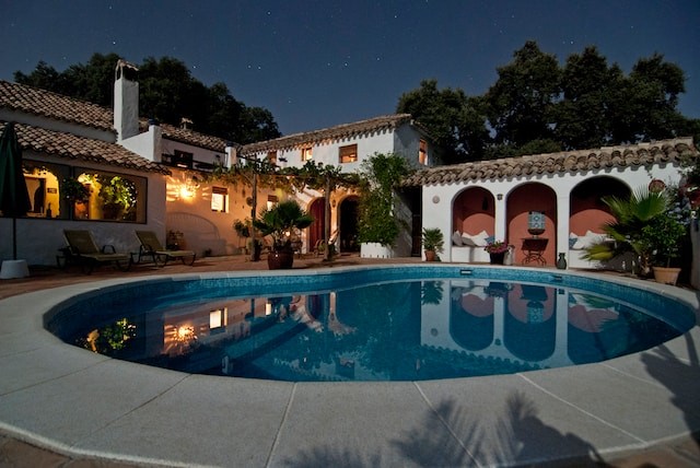 rounded pool in the night